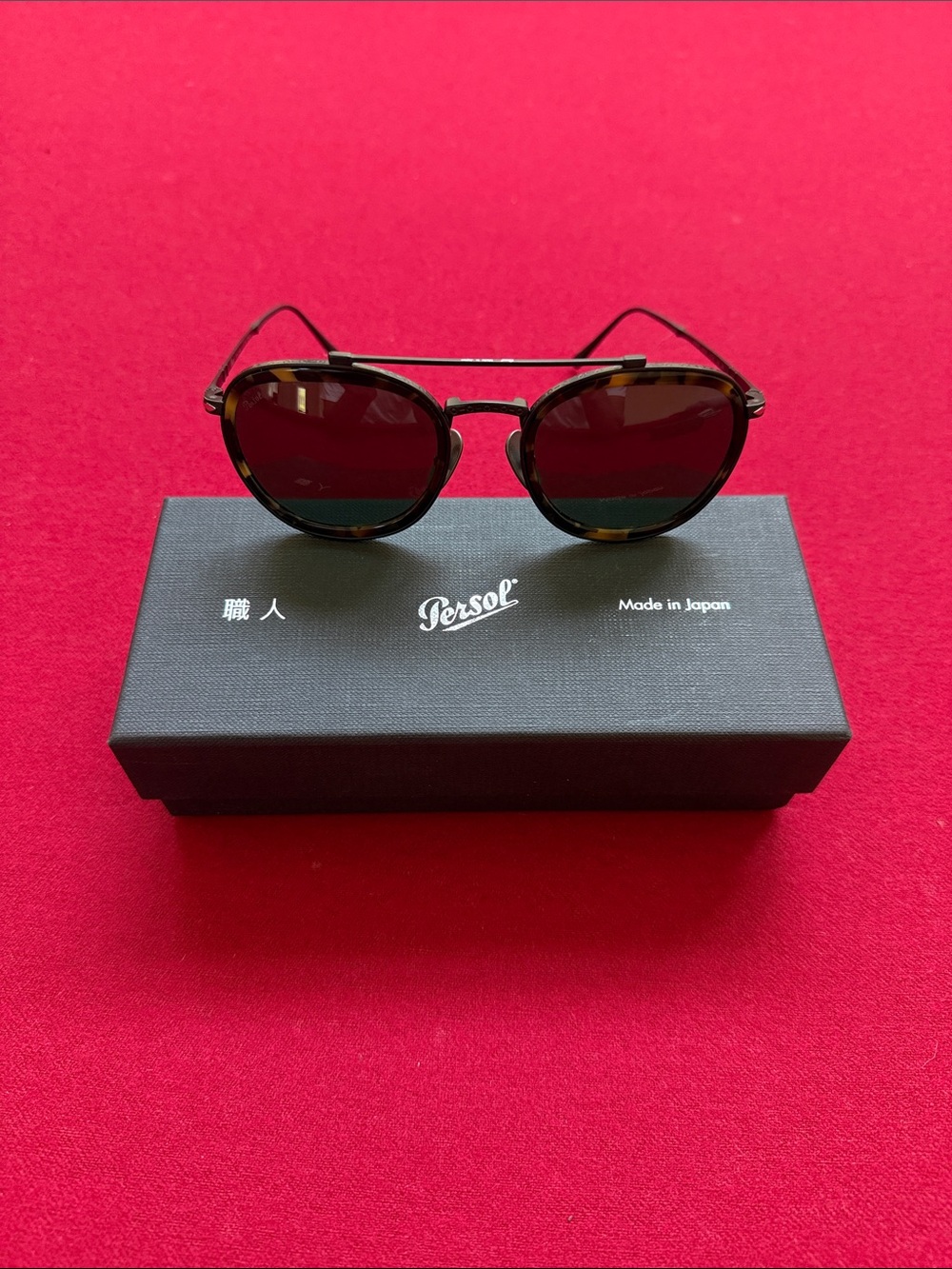Persol Women’s Black and Tortoiseshell Round Sunglasses